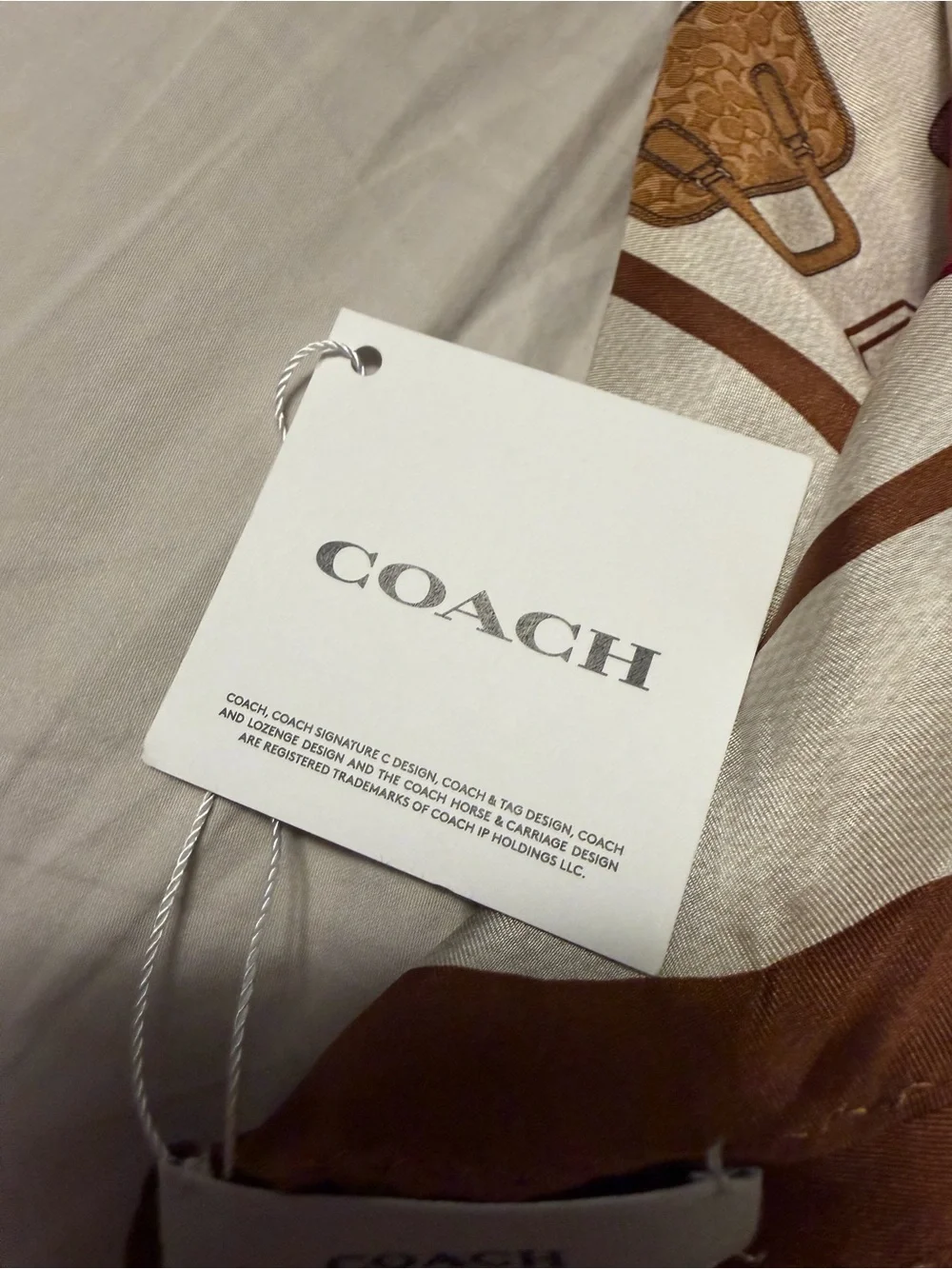 Coach Cream Scarf with Brown, Gold, Red and Pink Handbag Motif